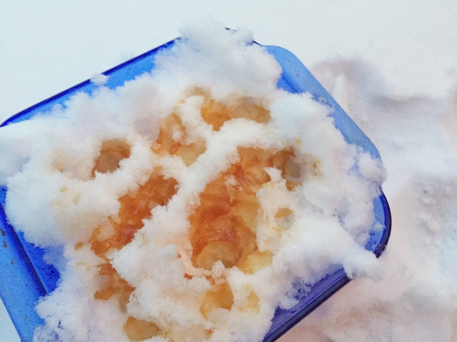 syrup hardens onto snow to create a sticky maple toffee candy