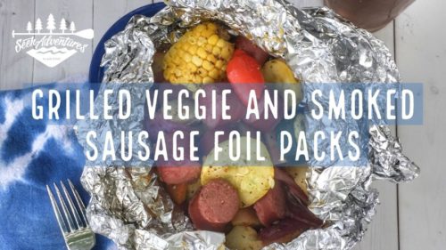 These grilled veggie and smoked sausage foil packs cook up quick and easy. These make for an easy camping meal or an quick weeknight dinner on the grill. #campingmeals #campingmenu #foilpacks #grillpacks #grilling