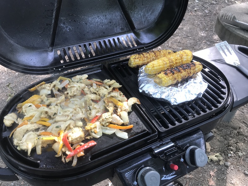 marinated chicken fajita mix being cooked on a grill