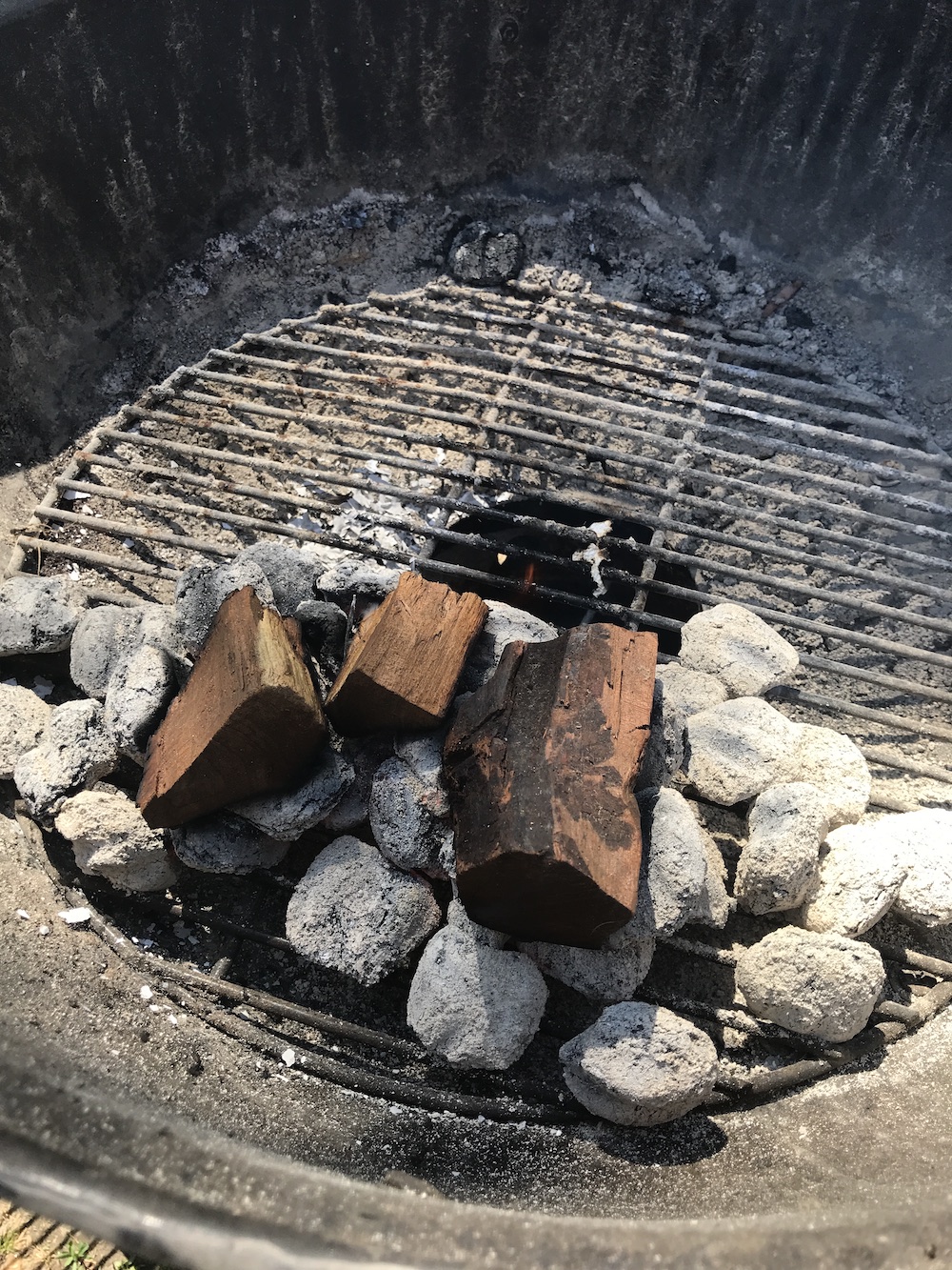 wood chunks on charcoal